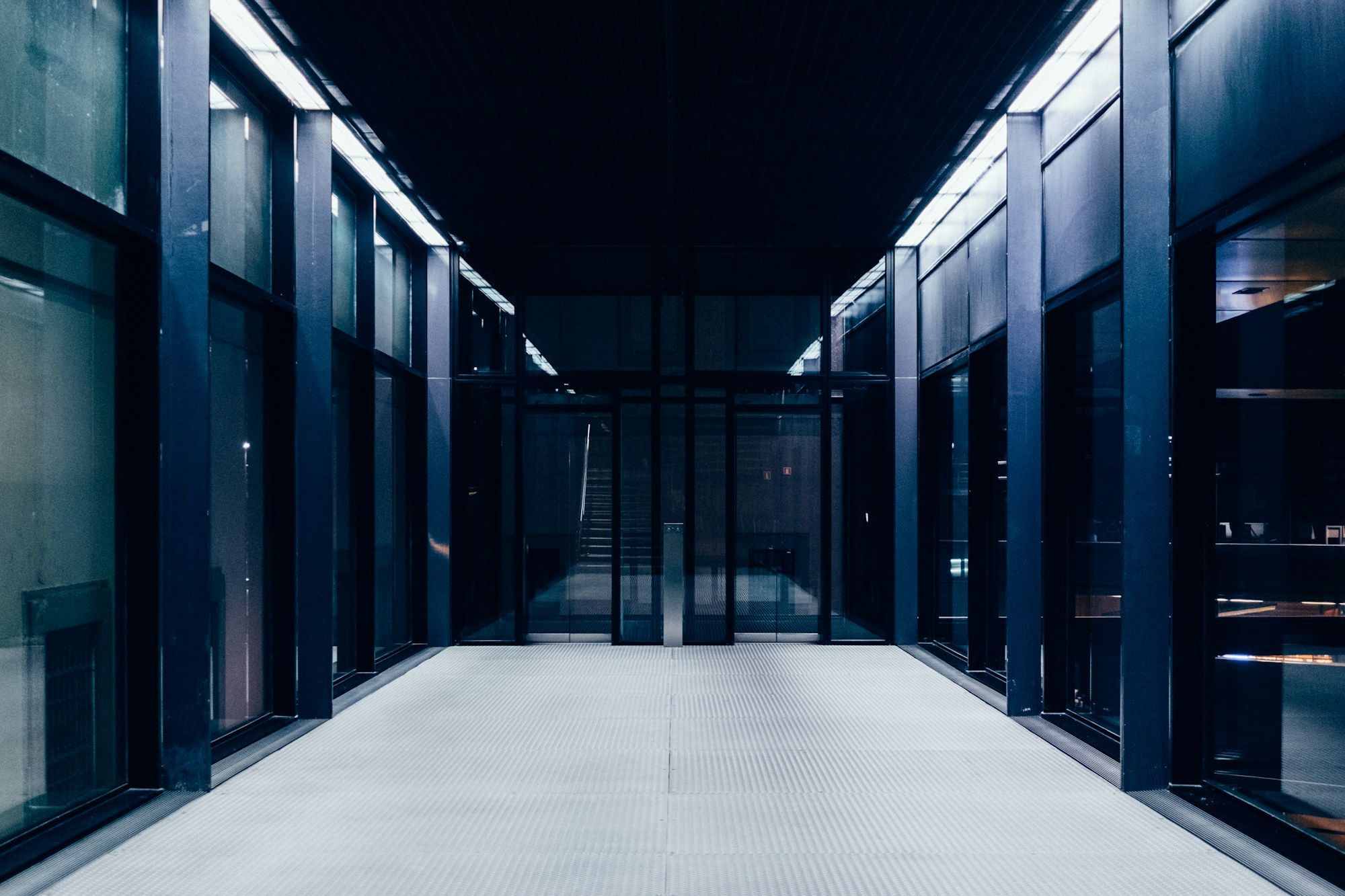 Data hall corridor lined with server racks